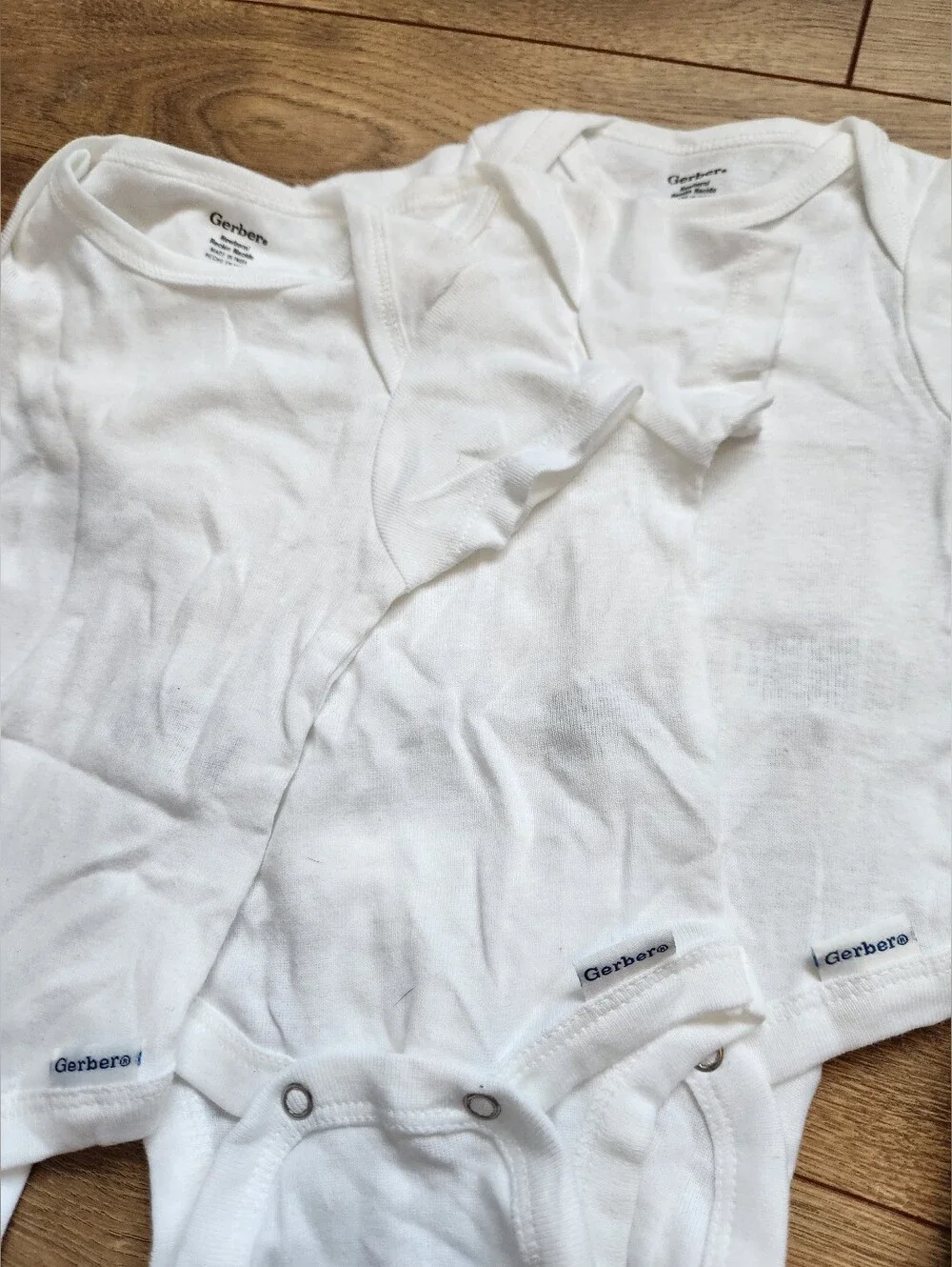 Newborn White Bodysuits